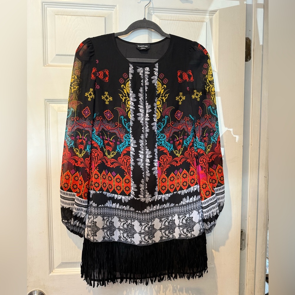 Bebe Colorful Boho tunic dress with suede fringe hem.